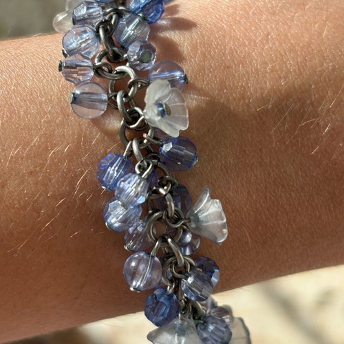 Bracelet with flowers in blue purple color, new