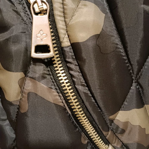 Rossodisera sleeveless jacket used with metallic details
