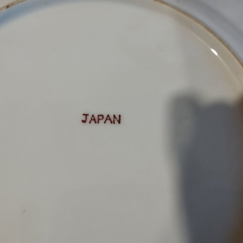 Decorative porcelain plates used from Japan with small chip