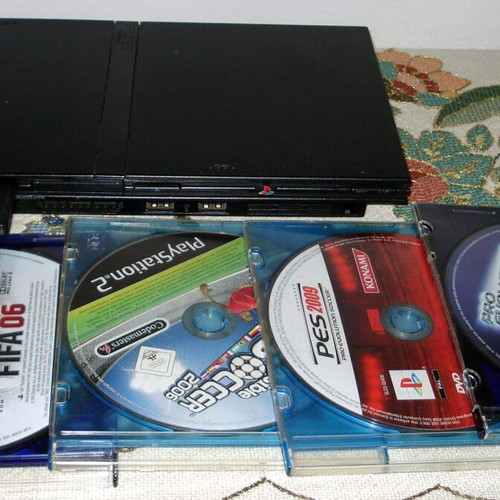 Sony PlayStation 2 Slim SCPH-70004 console bundle with controller and games