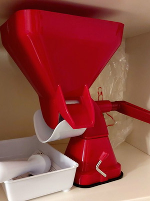 VICKO tomato press like new, manual with collection container