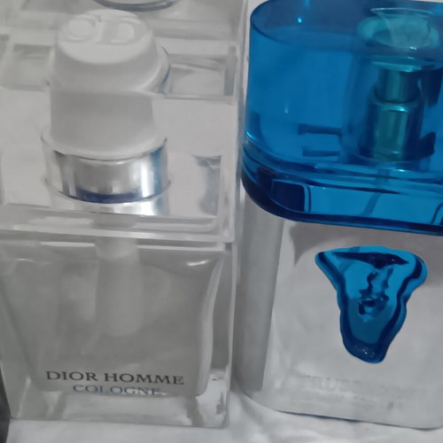 Set of 4 empty bottles from branded perfumes