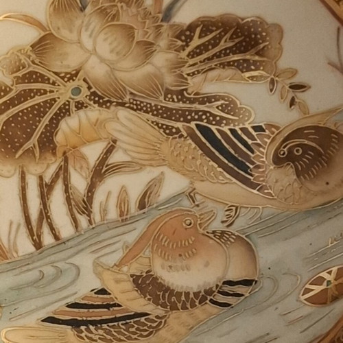 Chinese porcelain bowl like new with gilded details and lotus design