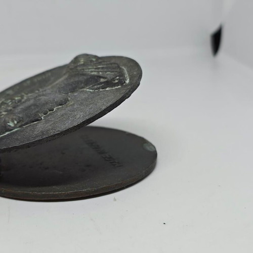 Vintage bronze Delphi paper clip 1947 used