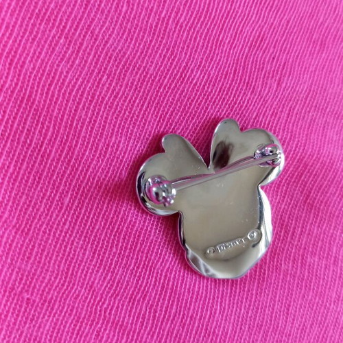 Disney x Swarovski Minnie Mouse pin like new with pink and black details