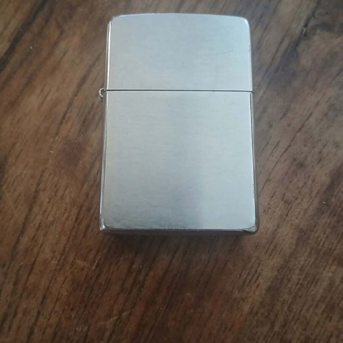 Zippo windproof lighter used with silver metal finish