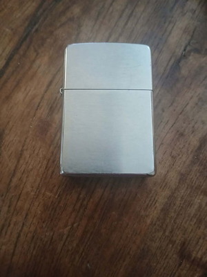 Zippo windproof lighter used with silver metal finish