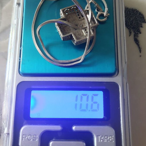 Silver 925 jewelry set like new, earrings and cross pendant