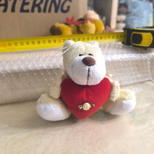 Small teddy bear with heart like new