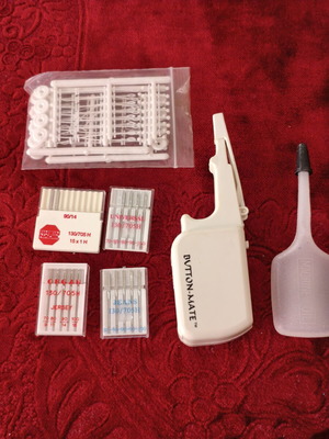 Sewing Machine Accessories Set like new with Needles, Button-Mate Tool & Oil