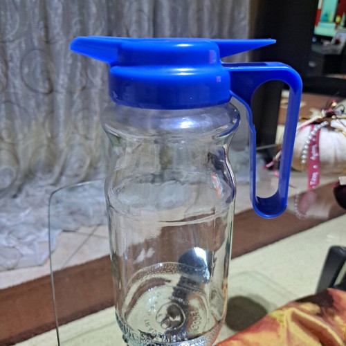 Glass jug with plastic screw cap like new