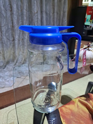 Glass jug with plastic screw cap like new