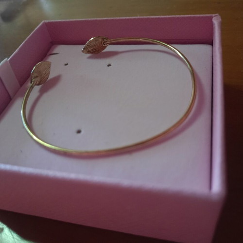 Adjustable bracelet used, gold tone