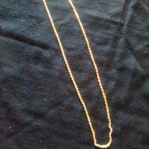 Necklace and earrings like new gold-colored