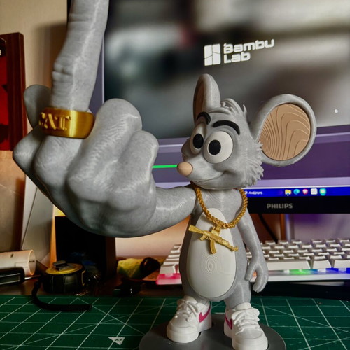 Rat Killah figure with gold CAT ring
