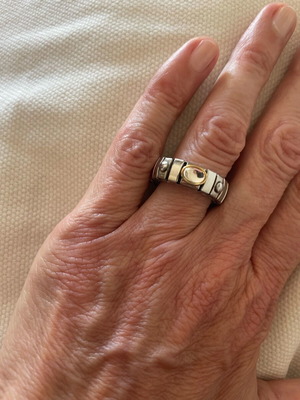Stainless steel ring with gold detail and clear stone like new