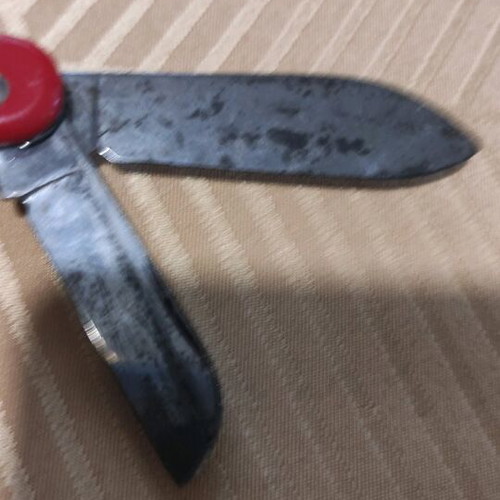 Colonial Swiss Master red multitool knife used