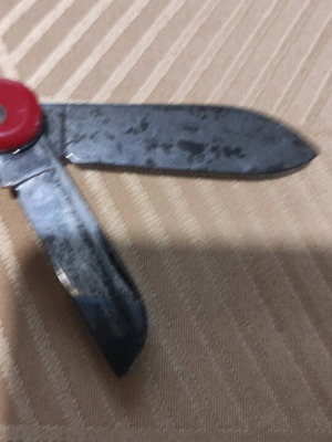 Colonial Swiss Master red multitool knife used