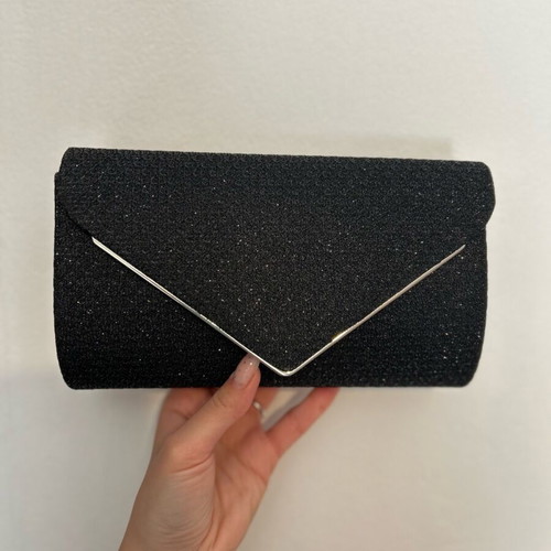 Black clutch handbag like new with embossed texture