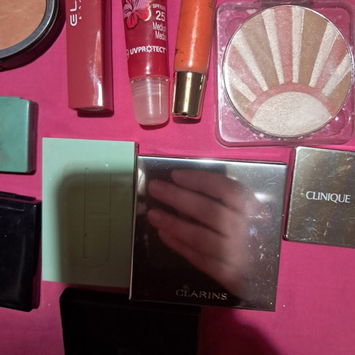 Large collection of branded cosmetics with YSL mirror and makeup bag