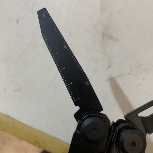 Staal multitool used with case and spare blades