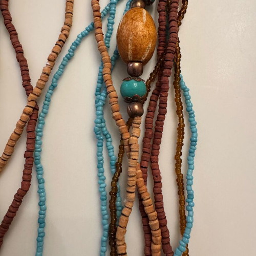 Women's long necklace from beads and wood like new, turquoise and brown