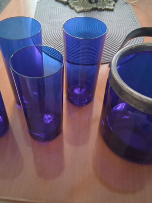 Set of 4 blue glass ouzo glasses and matching ice bucket like new