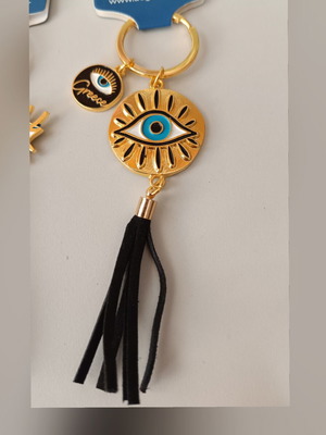 Aegeanart keychain new, gold with black tassel and evil eye