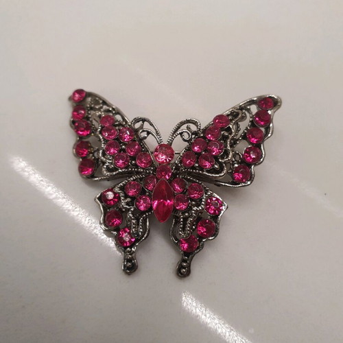 Butterfly pin like new
