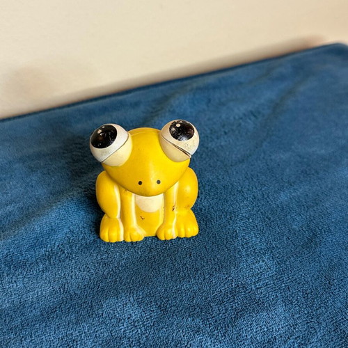Vintage frog lighter used with retro design