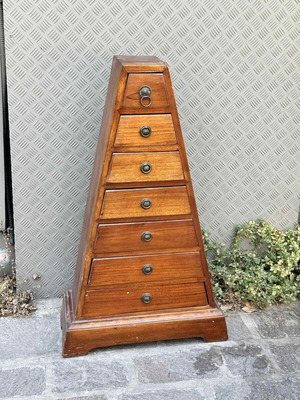 Wooden pyramid-shaped chest of drawers used with 7 drawers