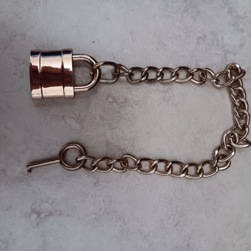 Small padlock with key used, in good condition