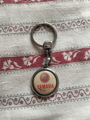 Yamaha keychain used, white and red