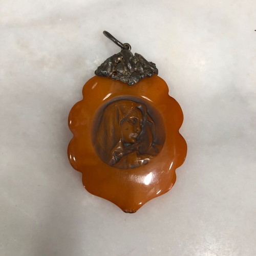 Amber pendant used, orange color