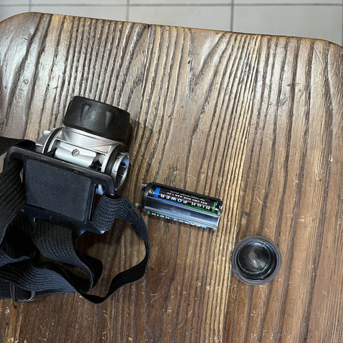 Headlamp used, 3xAAA batteries, 3 lighting modes and strobe