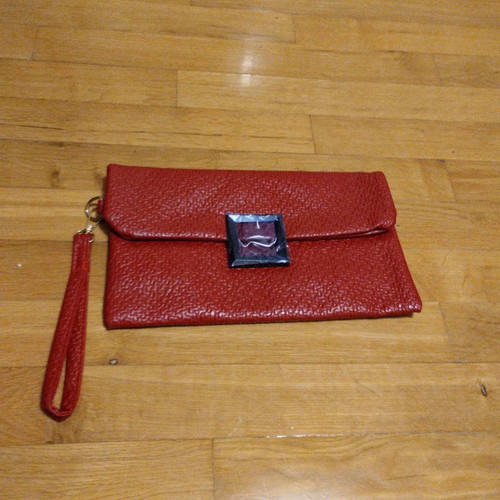 Vintage style red clutch unused with clasp and wrist strap