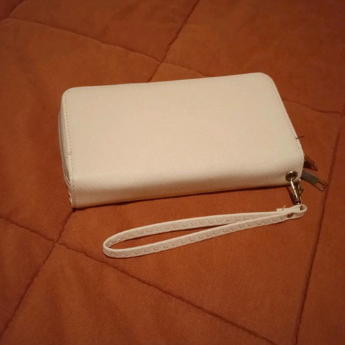 Women's wallet used, pink with detachable strap