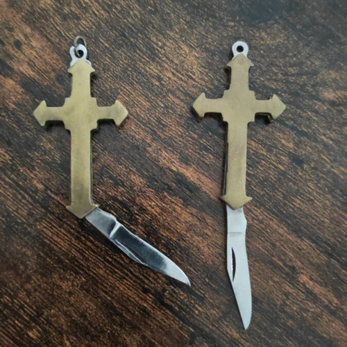 Copper cross keychains with sharp knives, like new, set of 2