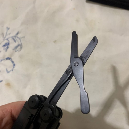 Staal multitool used with case and spare blades