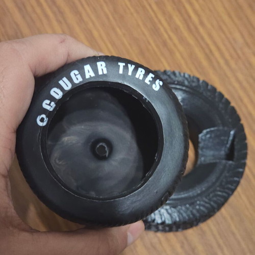 Set of pencil holder and business card case in tire shape like new