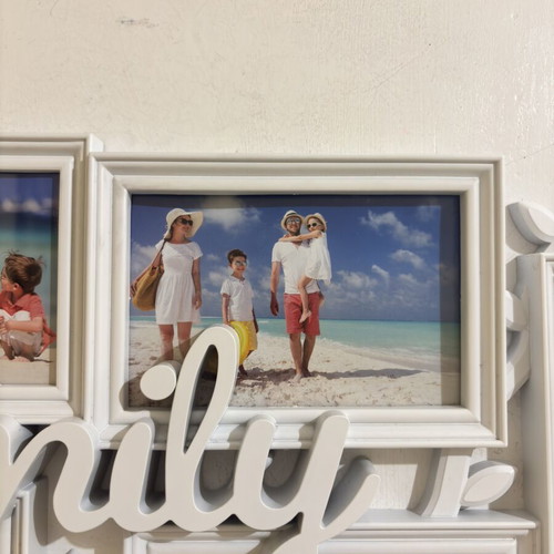 Plastic photo frame Family with 6 openings, like new