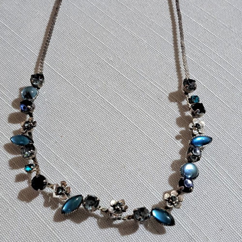 Necklace with silver chain and blue stones