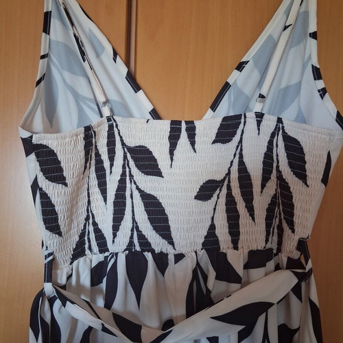 Jumpsuit new, white with large black leaf pattern, adjustable straps