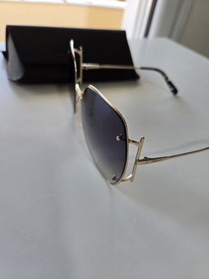 Salvatore Ferragamo sunglasses new, gold color