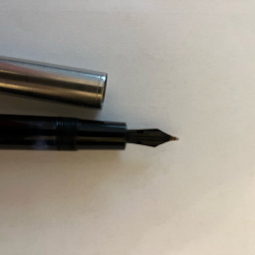 Pen with 14kt gold nib old used with piston