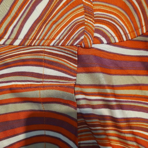 Batida skirt used with color blocking in purple, orange, beige, white