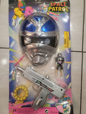 Vintage Space Patrol card with mask, gun and figure 80's new