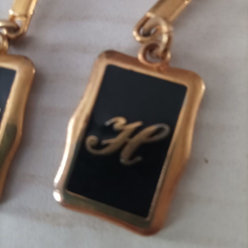 Keychain set 2 pieces with letter H like new