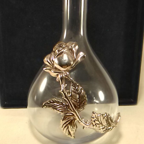 Crystal pitcher with silver-plated decorative rose used