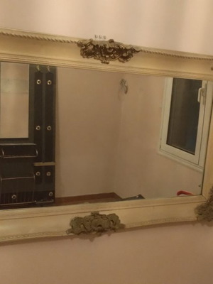 Vintage mirror with white frame and gold details
